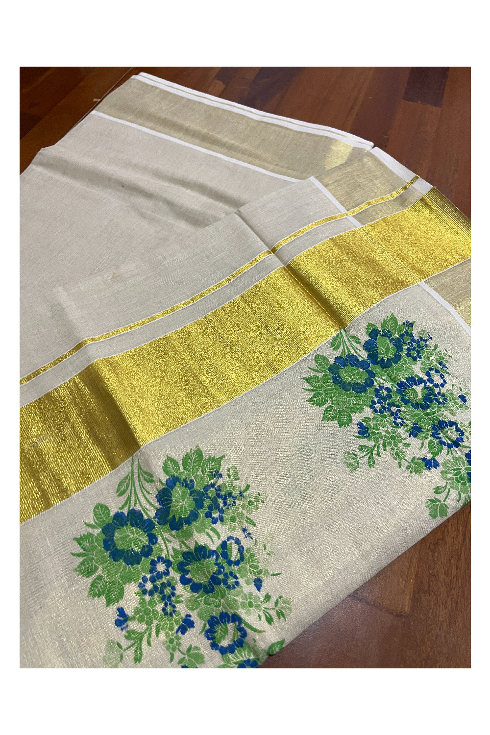 Kerala Tissue Kasavu Saree with Green Floral Block Printed Design