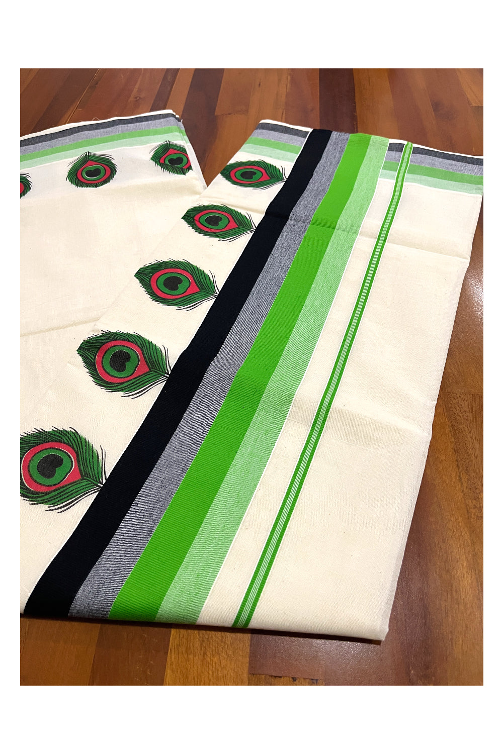 Kerala Cotton Saree with Green Peacock Feather Mural Printed and Black Green Border