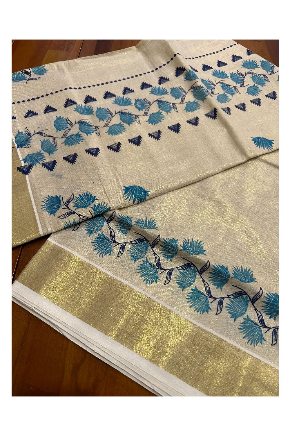 Kerala Tissue Kasavu Saree with Blue Floral Block Printed Design Border