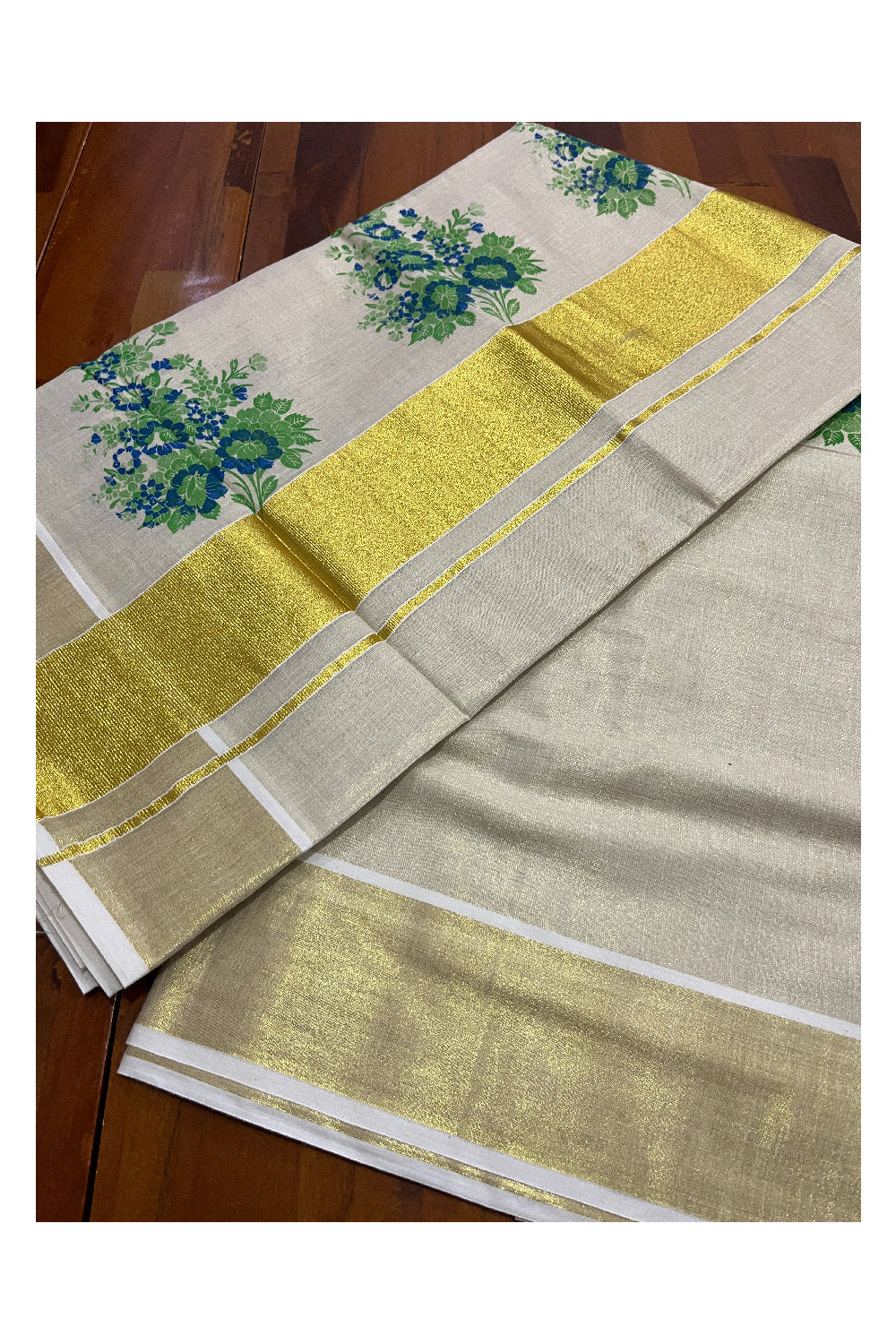 Kerala Tissue Kasavu Saree with Green Floral Block Printed Design