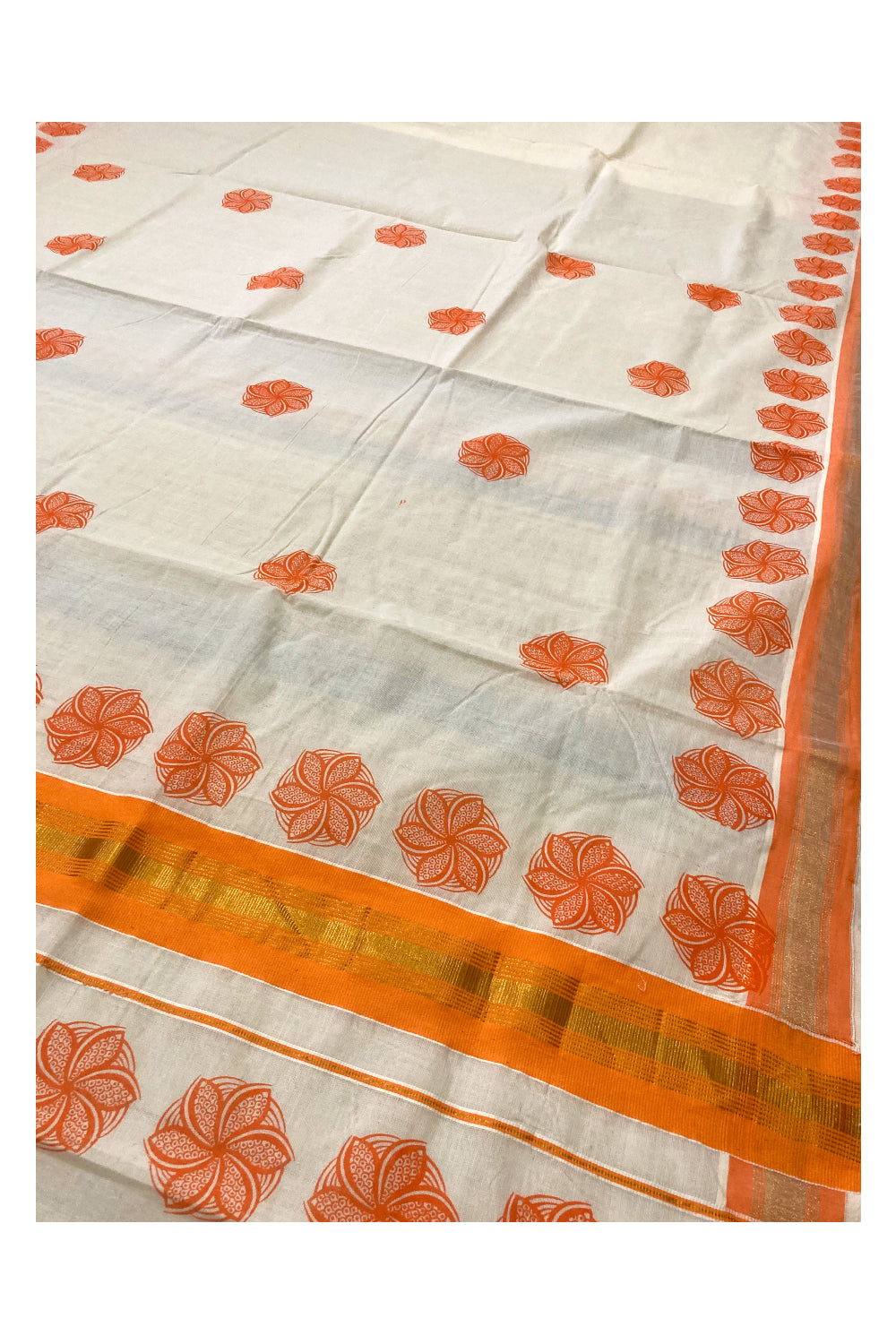 Pure Cotton Kerala Saree with Orange. Floral Block Printed Design and Kasavu Border