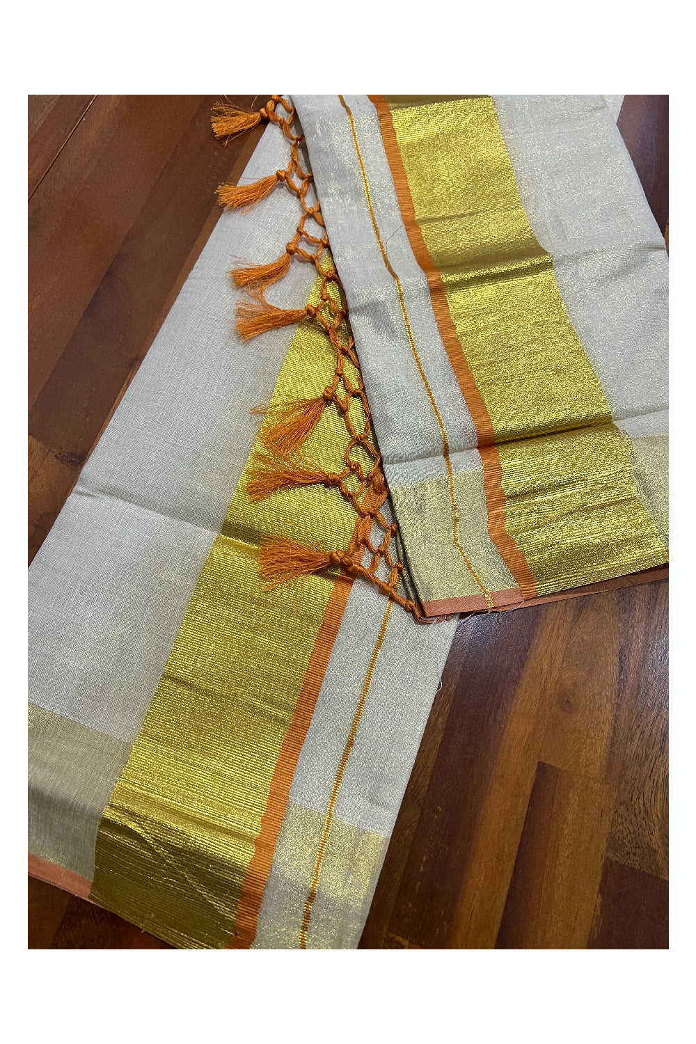 Kerala Tissue Kasavu Set Mundu (Mundum Neriyathum) with Kasavu and Orange Border and Tassels Work