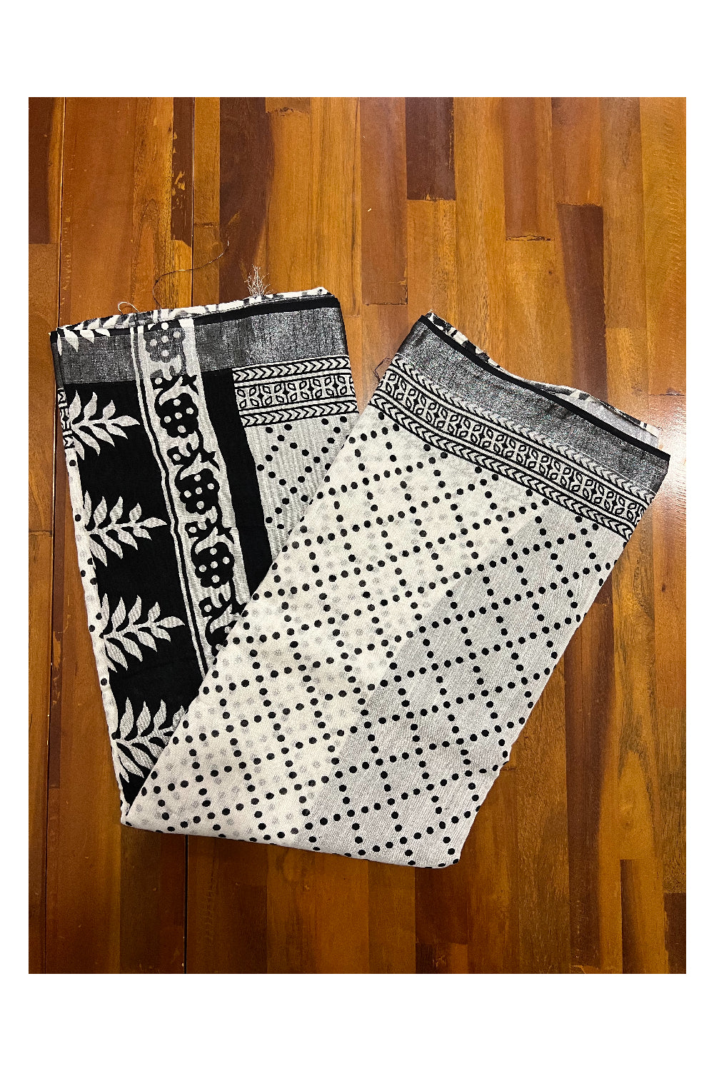 Southloom Linen White and Black Printed Designer Saree with Tassels on Pallu