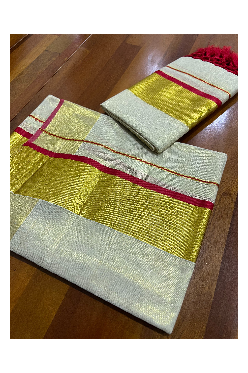 Kerala Tissue Kasavu Set Mundu (Mundum Neriyathum) with Kasavu and Red Border and Tassels Work