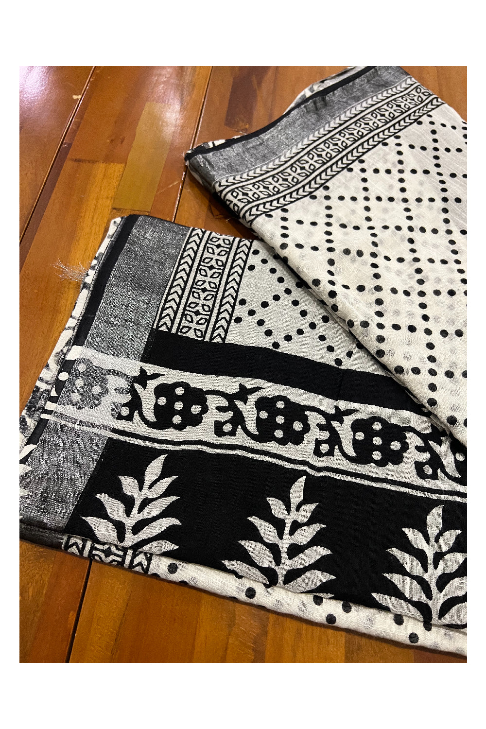 Southloom Linen White and Black Printed Designer Saree with Tassels on Pallu