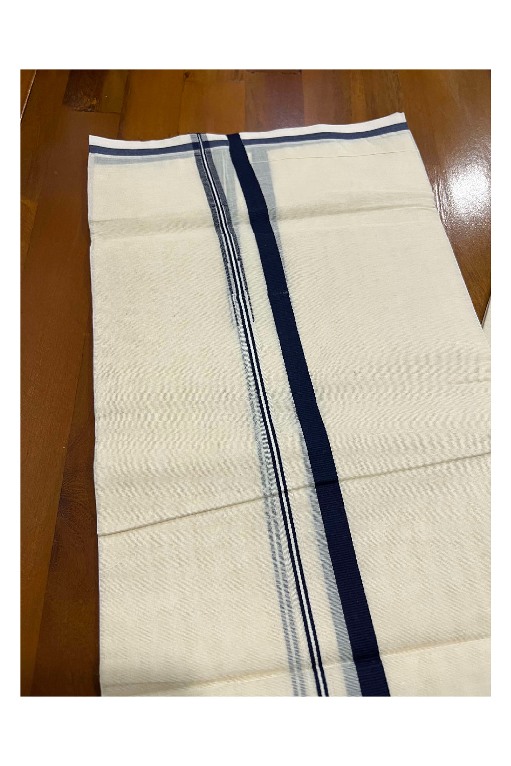 Off White Cotton Mundu with Navy Blue Puliyilakkara Border (South Indian Dhoti)