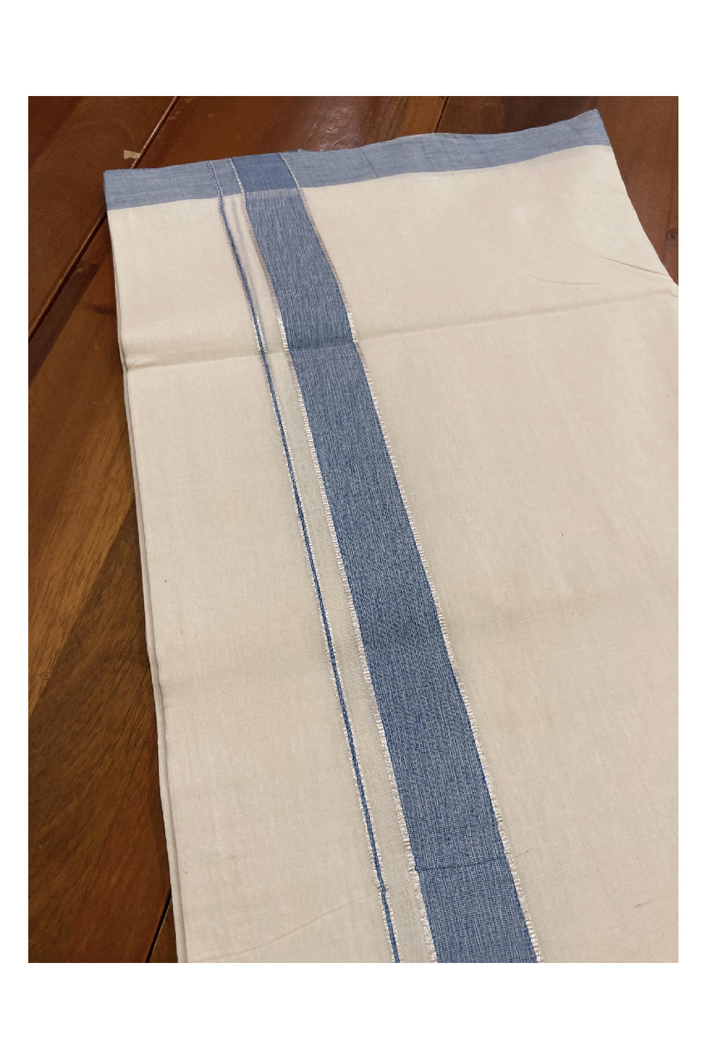 Southloom Balaramapuram Unakkupaavu Premium Handloom Mundu with Light Blue and Silver Kasavu Border