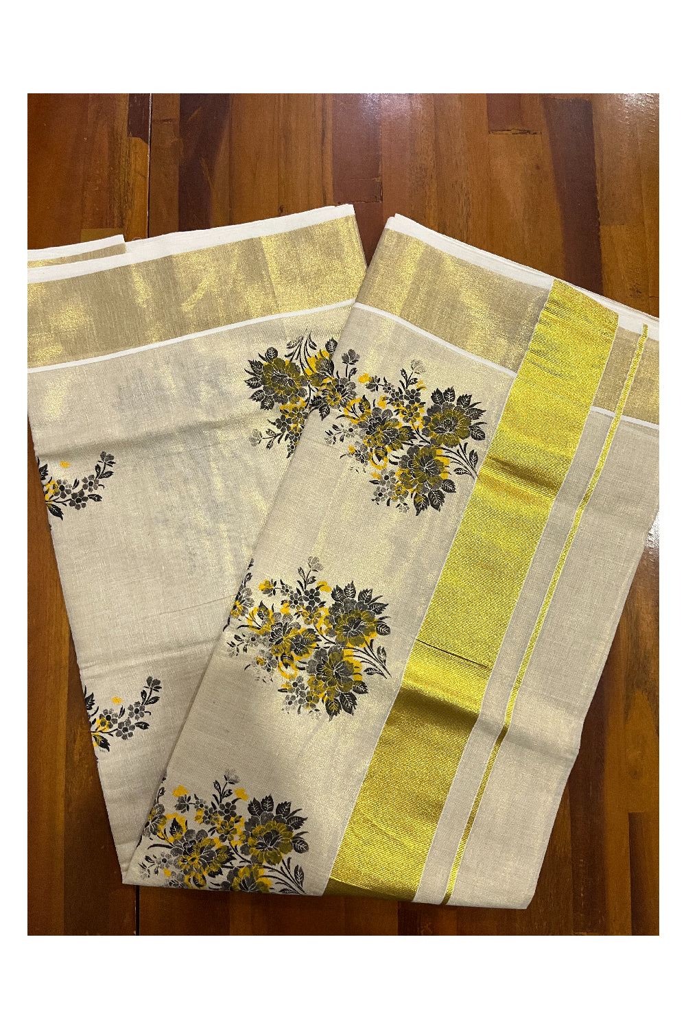 Kerala Tissue Kasavu Saree with Black Floral Block Printed Design