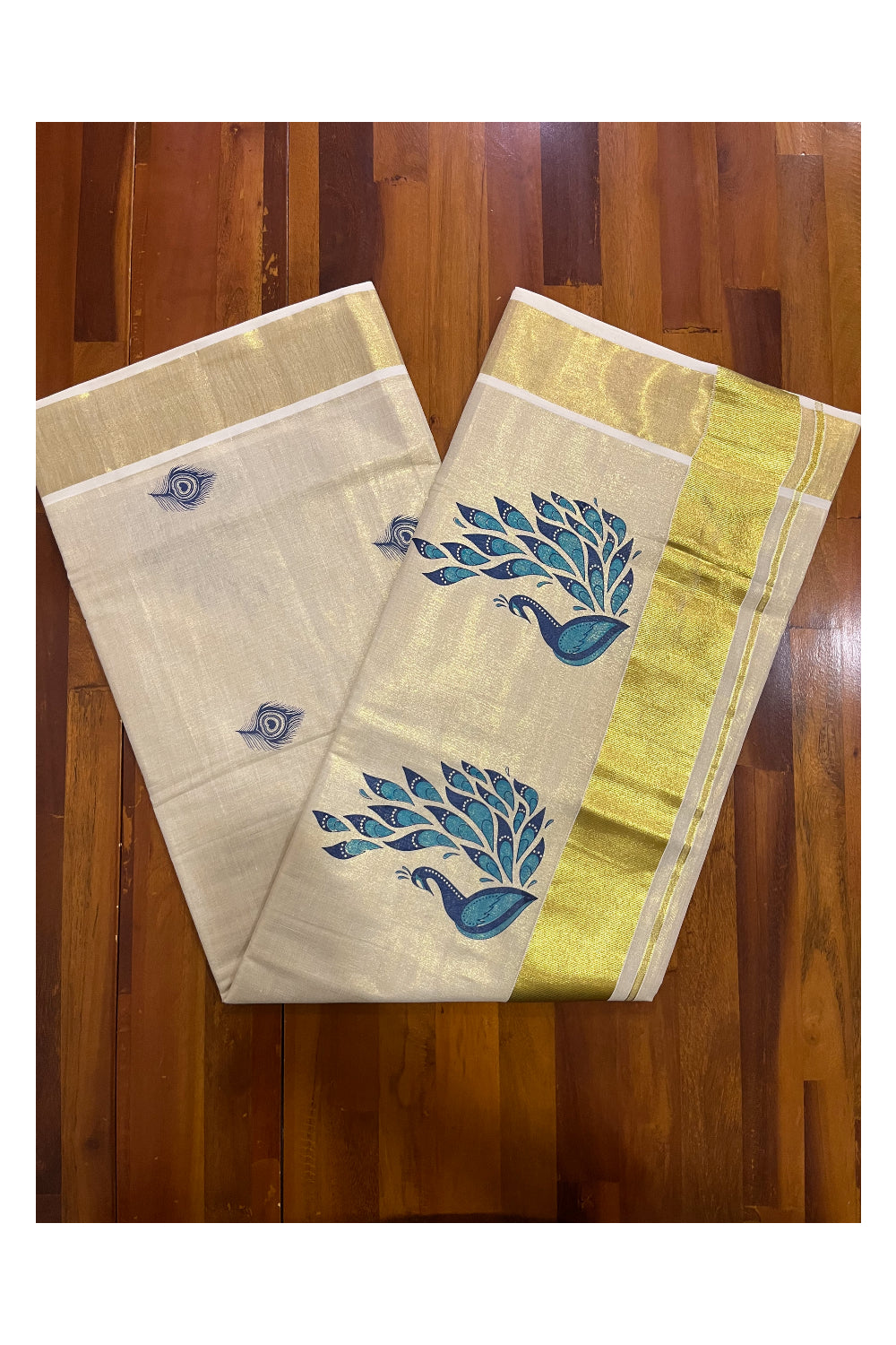 Kerala Tissue Kasavu Saree With Blue Peacock Mural Design