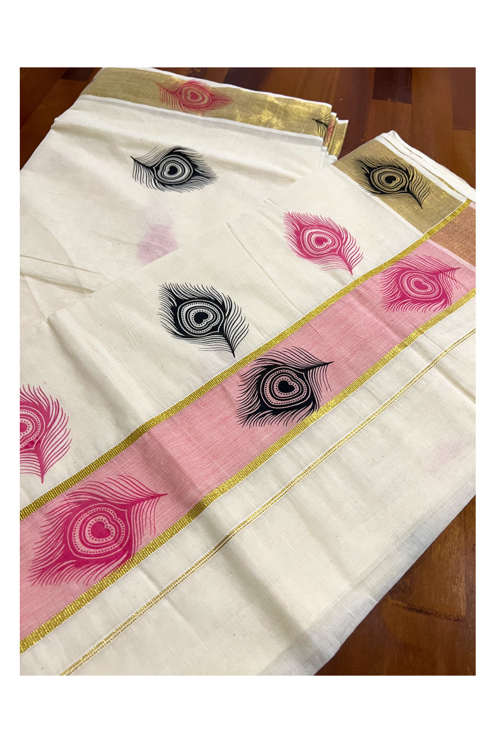 Pure Cotton Kerala Kasavu Saree with Pink and Black Feather Block Printed Design