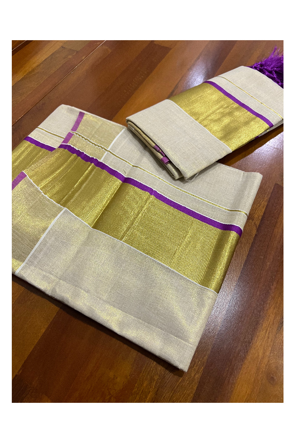 Kerala Tissue Kasavu Set Mundu (Mundum Neriyathum) with Kasavu and Dark Magenta Border and Tassels Work