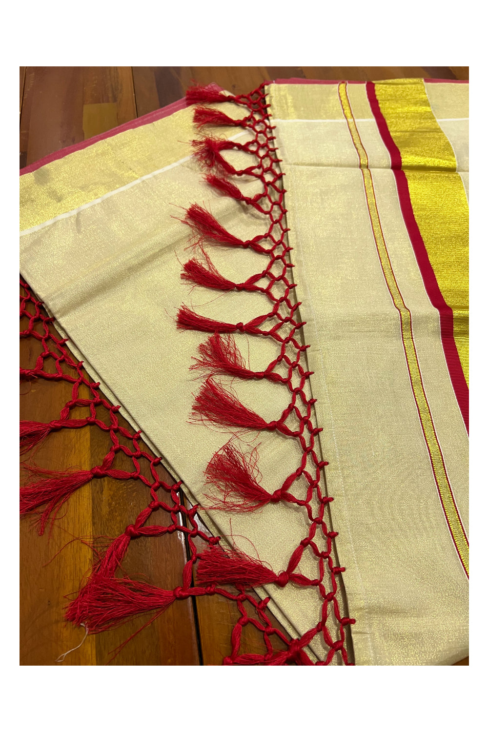 Kerala Kasavu Tissue Saree with Red Narrow Border and Tassels