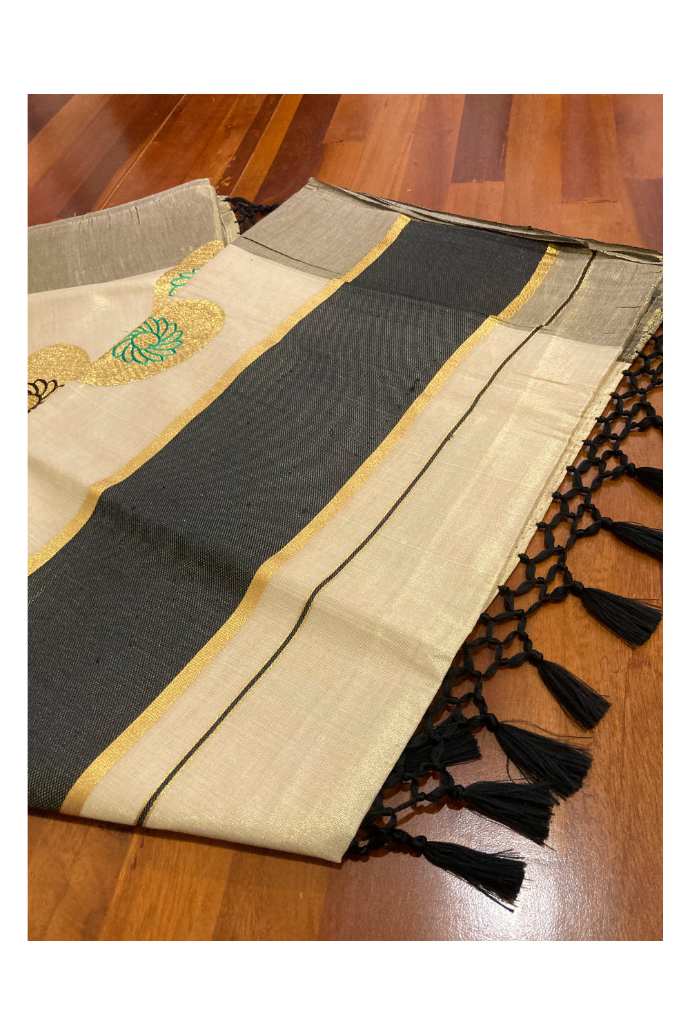 Kerala Tissue Kasavu Saree with Embroidery Works and Black Border