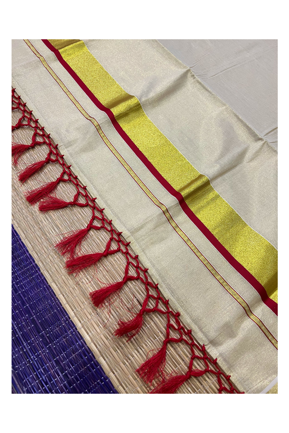 Kerala Kasavu Tissue Saree with Red Narrow Border and Tassels