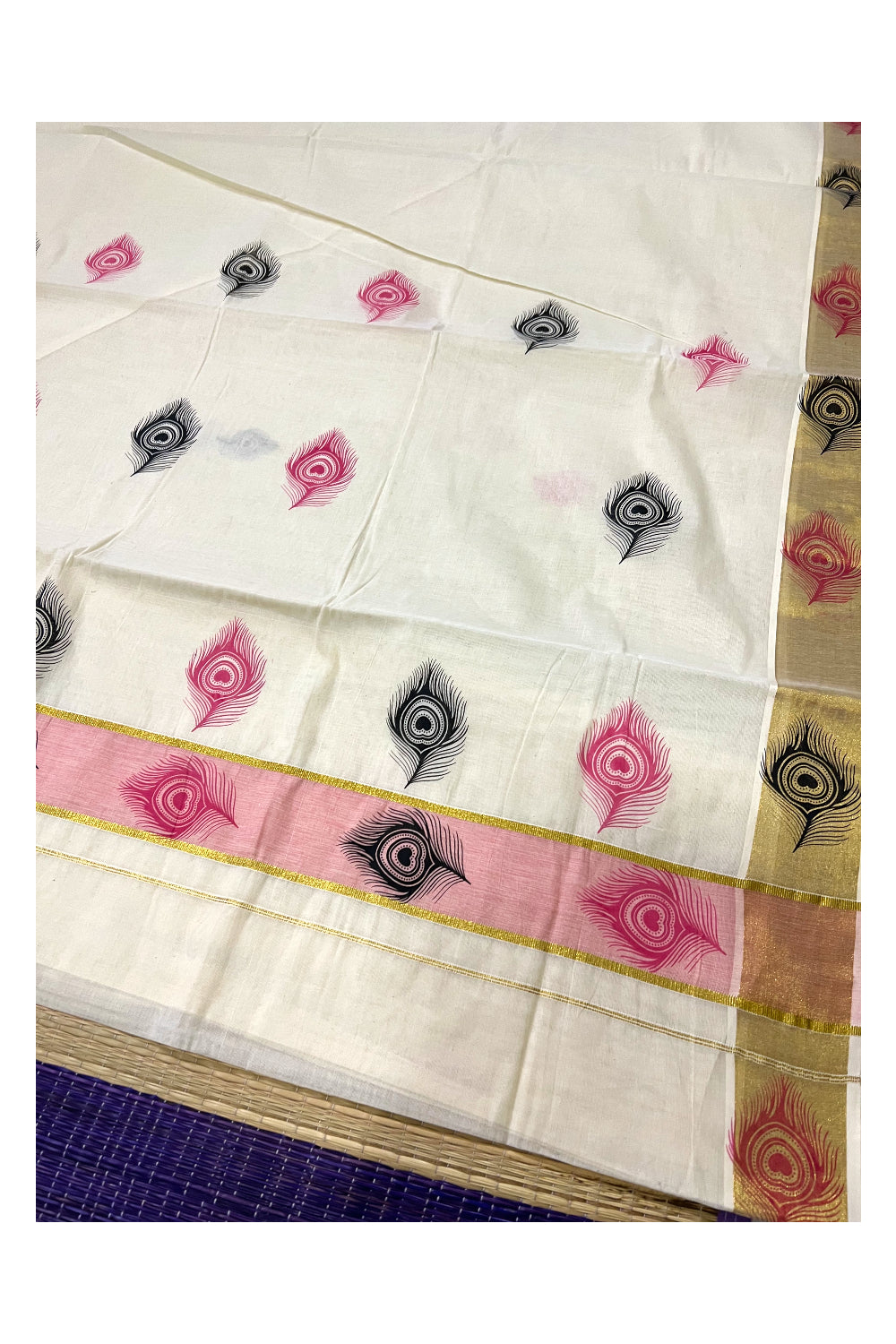 Pure Cotton Kerala Kasavu Saree with Pink and Black Feather Block Printed Design