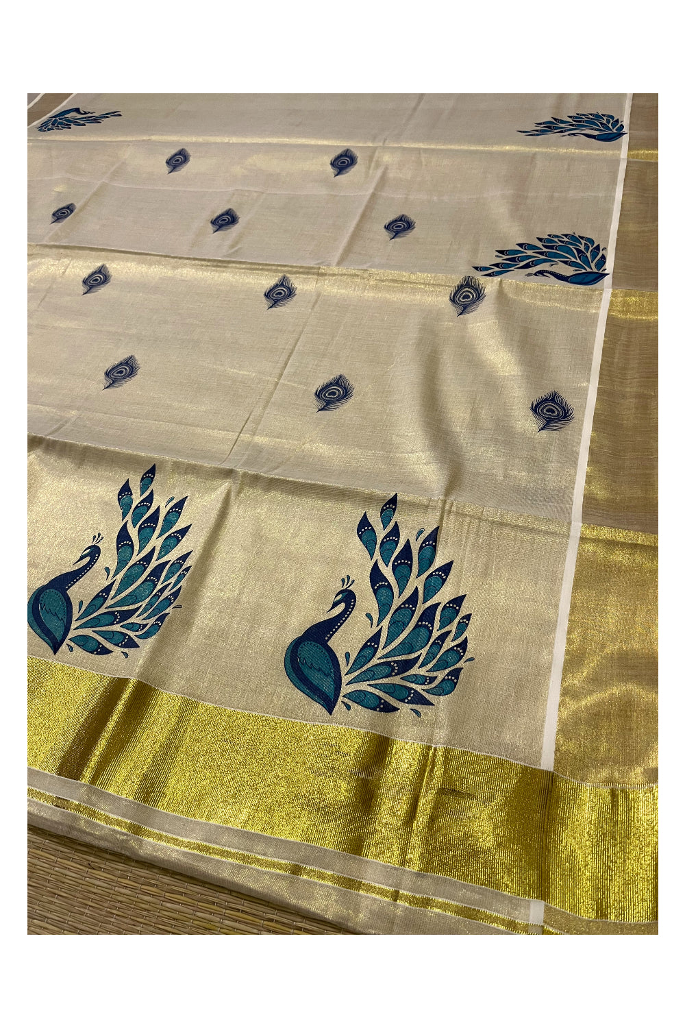 Kerala Tissue Kasavu Saree With Blue Peacock Mural Design