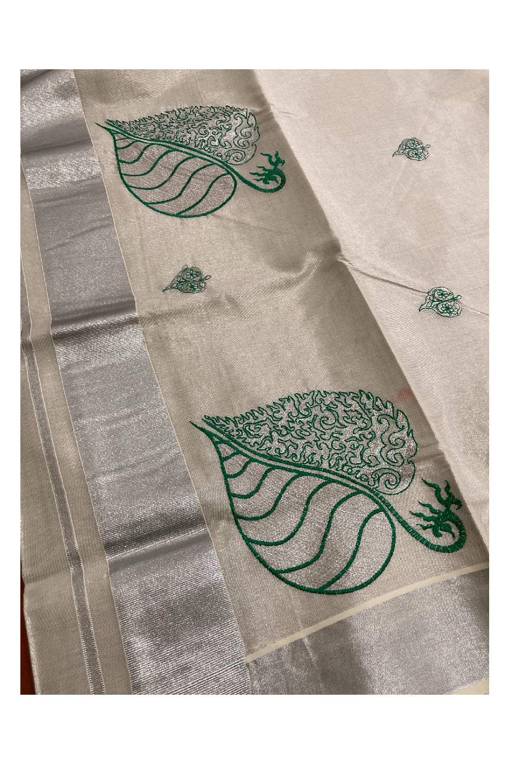 Kerala Silver Tissue Kasavu Saree with Leaf Embroidery Design