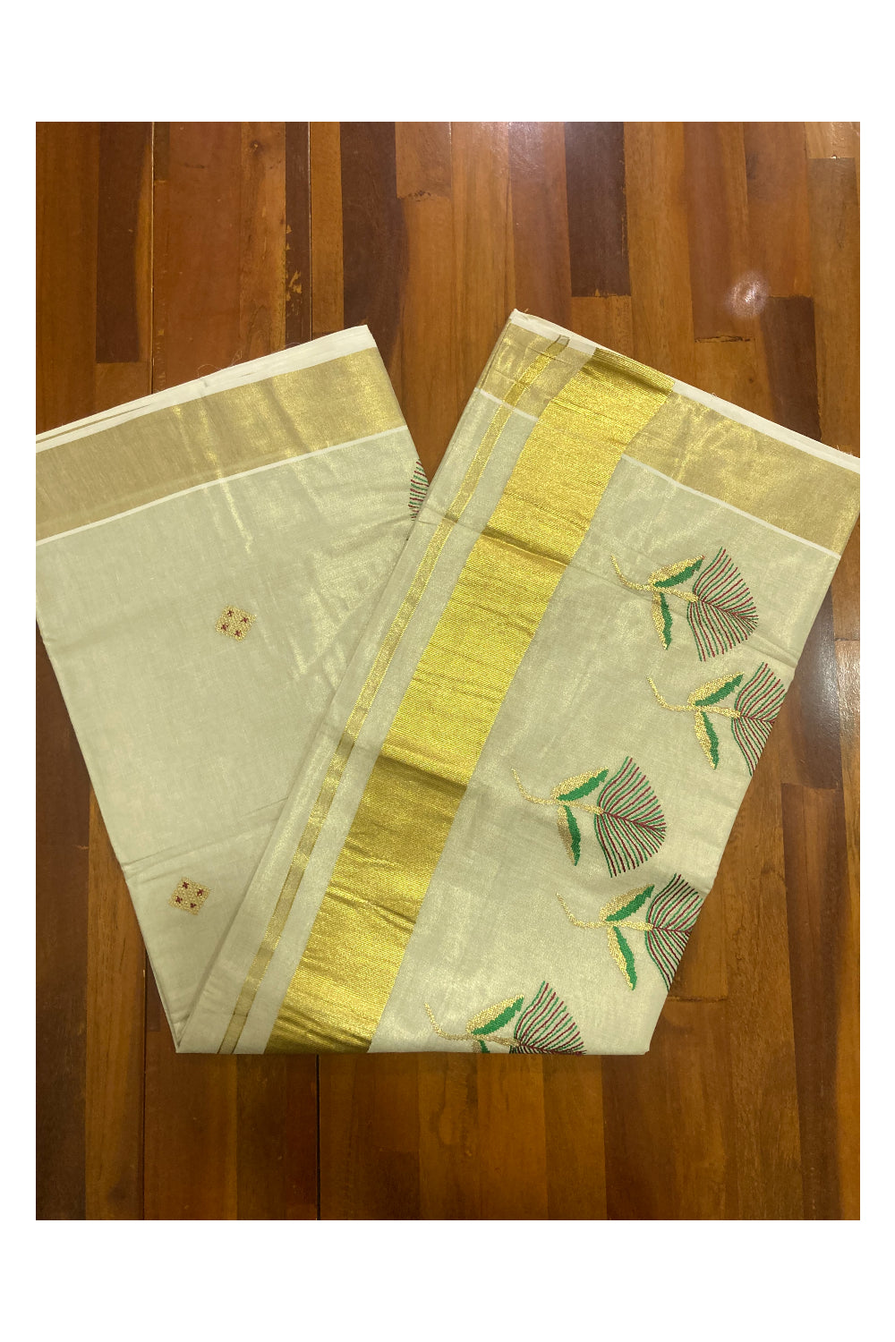 Kerala Tissue Kasavu Saree with Floral Embroidery Works