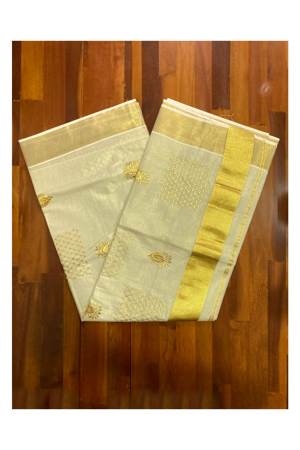 Kerala Tissue Kasavu Saree with Floral Golden Embroidery Works