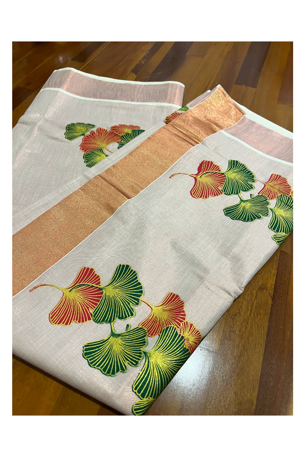 Kerala Copper Tissue Kasavu Saree With Mural Printed Light Green and Red Floral Design