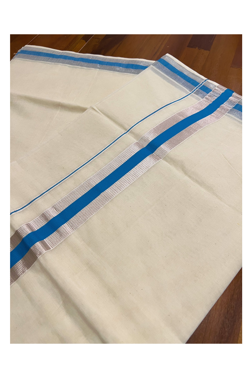 Pure Cotton Kerala Saree with Silver Kasavu and Light Blue Border