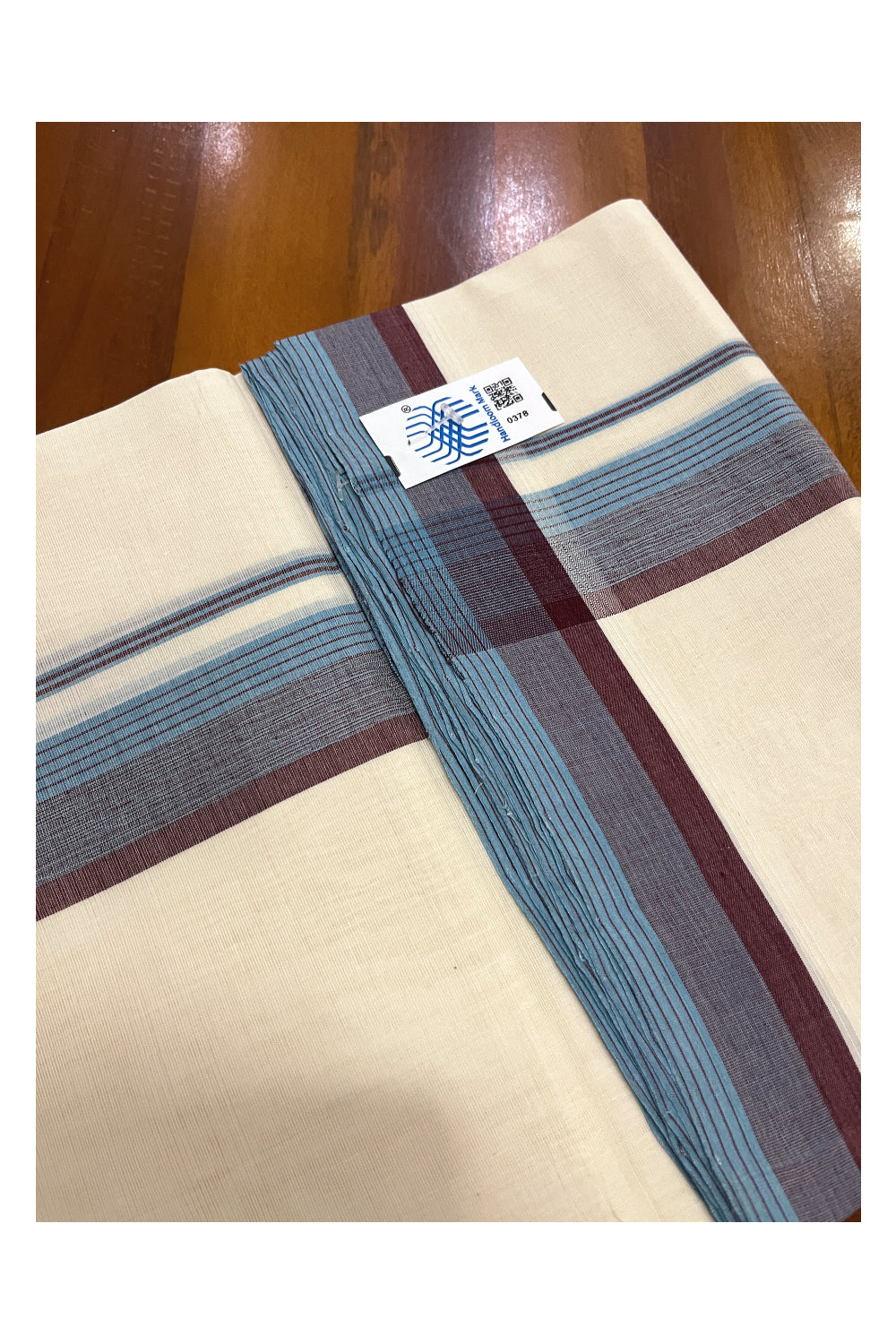 Southloom Premium Unakkupaavu Handloom Mundu with Brown and Blue Lines Border (South Indian Dhoti)