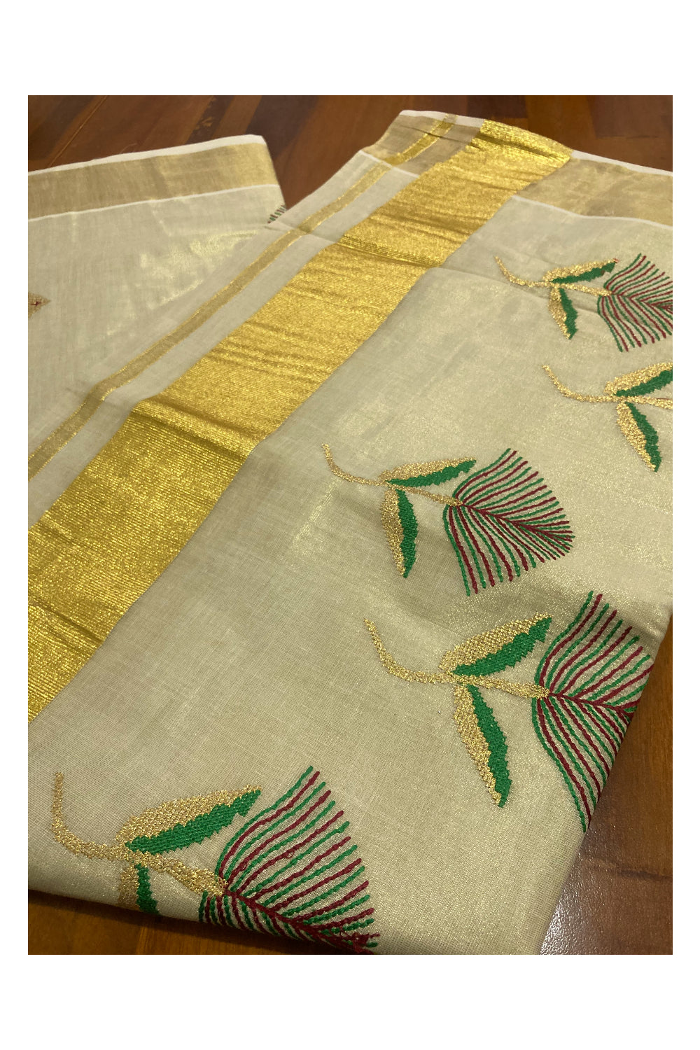 Kerala Tissue Kasavu Saree with Floral Embroidery Works