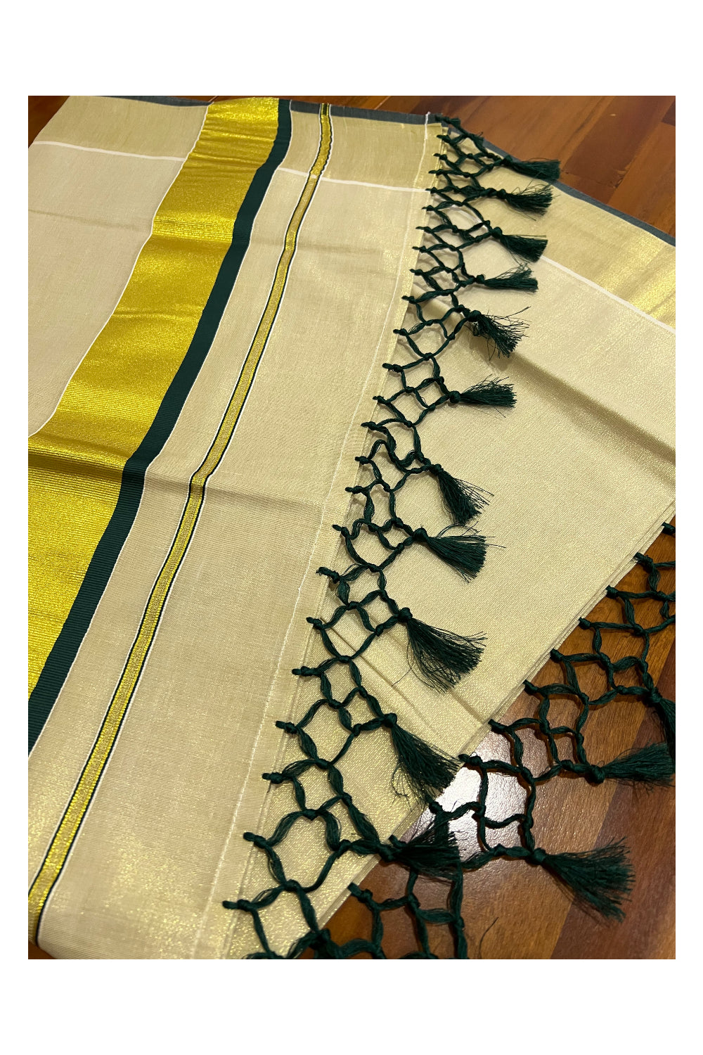 Kerala Kasavu Tissue Saree with Dark Green Narrow Border and Tassels