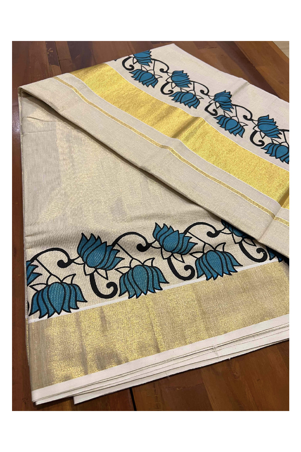 Kerala Tissue Kasavu Saree With Mural Blue Floral Design on Pallu and Border