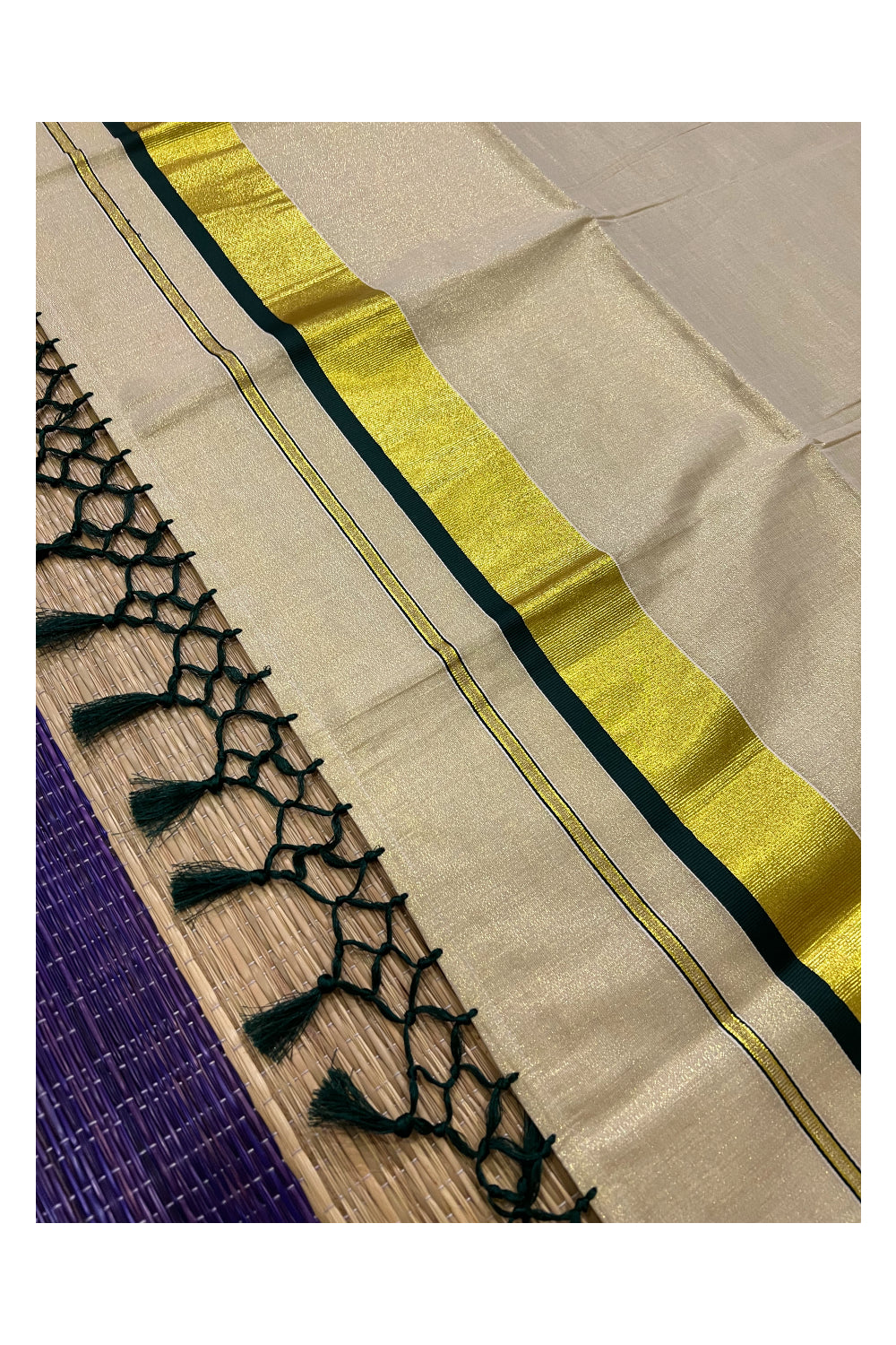 Kerala Kasavu Tissue Saree with Dark Green Narrow Border and Tassels