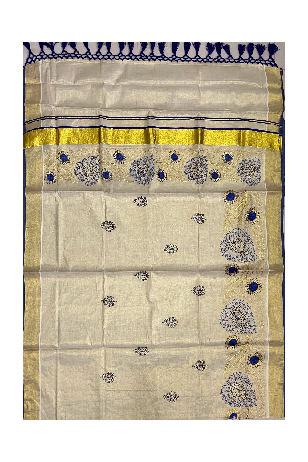 Kerala Tissue Kasavu Heavy Work Saree with Golden and Blue Floral Embroidery Design