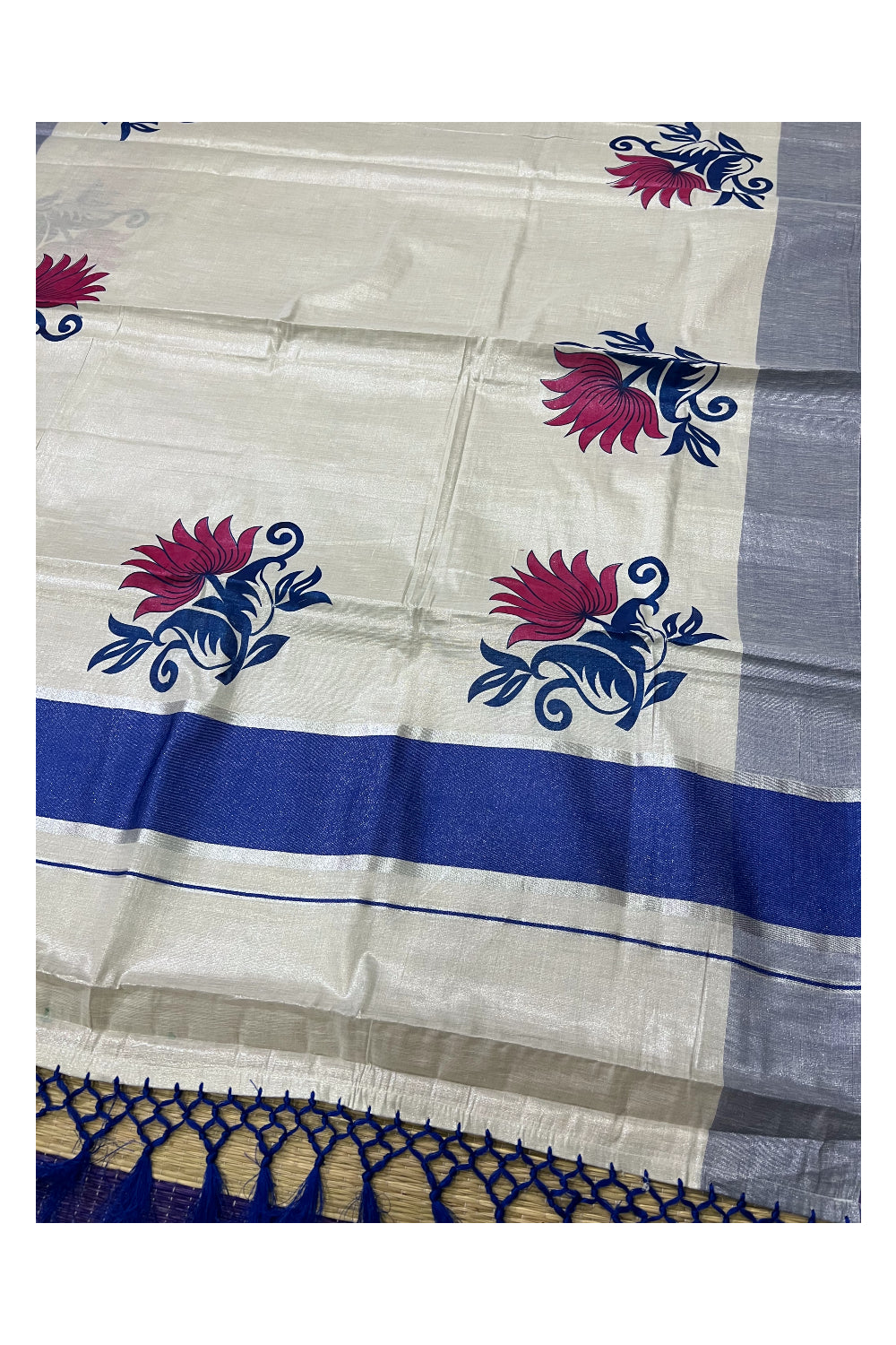 Kerala Tissue Kasavu Saree with Blue Magenta Mural Floral Design and Tassels on Pallu