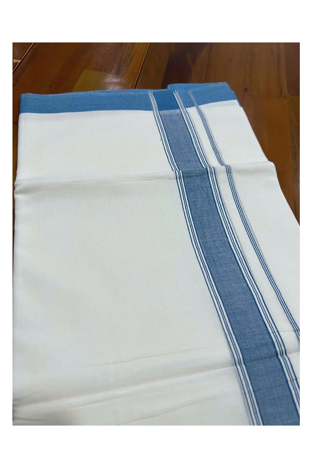 Pure White Cotton Mundu with Light Blue Line Kara (South Indian Dhoti)