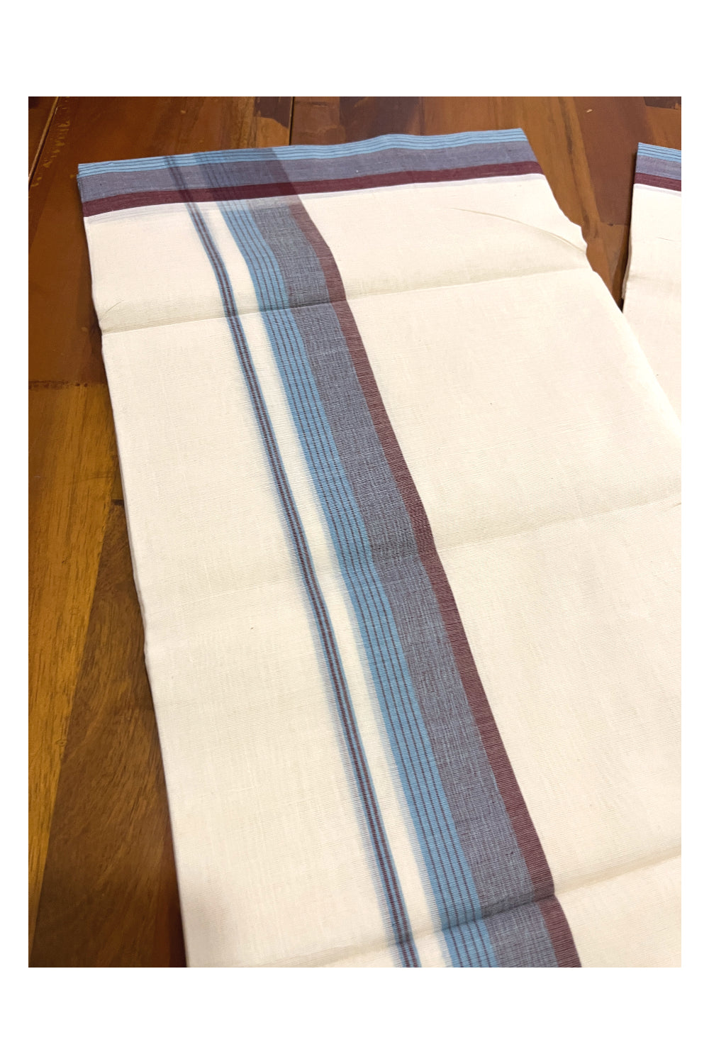 Southloom Premium Unakkupaavu Handloom Mundu with Brown and Blue Lines Border (South Indian Dhoti)