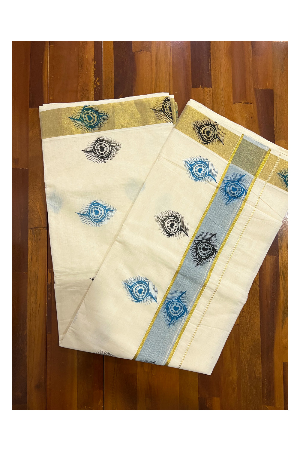 Pure Cotton Kerala Kasavu Saree with Light Blue and Black Feather Block Printed Design