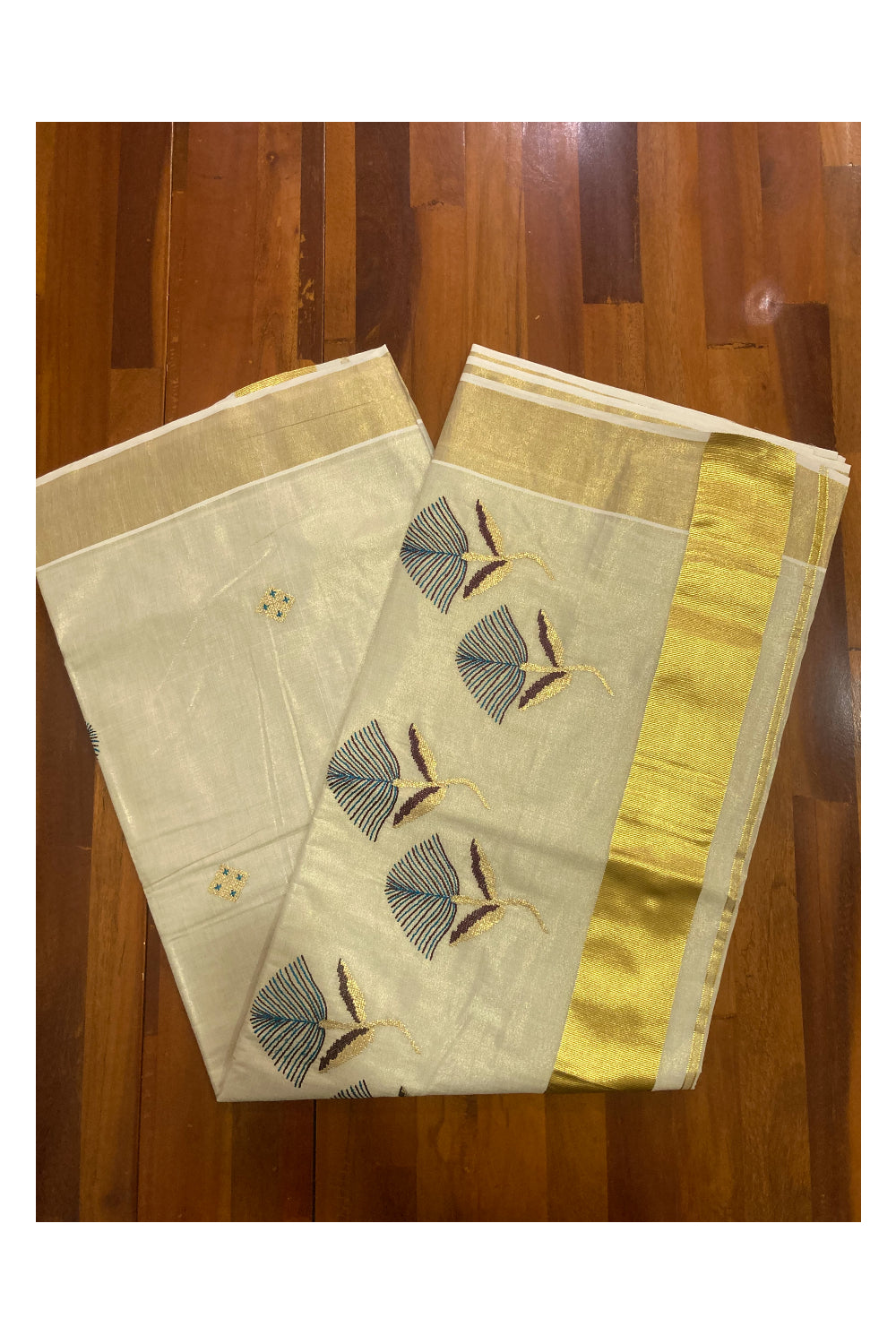 Kerala Tissue Kasavu Saree with Floral Embroidery Works