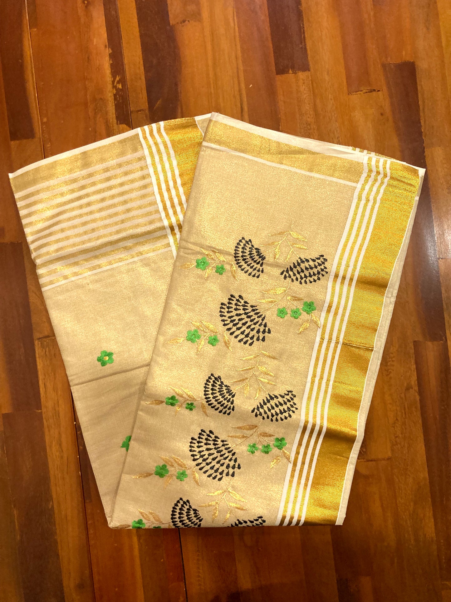 Kerala Kasavu Tissue Saree with Floral Thread works on Pallu and Border