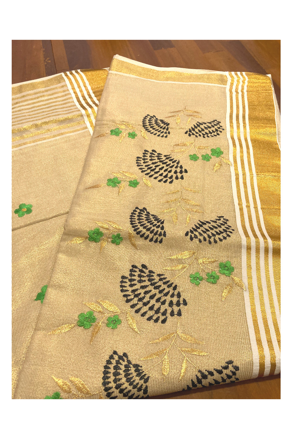 Kerala Kasavu Tissue Saree with Floral Thread works on Pallu and Border