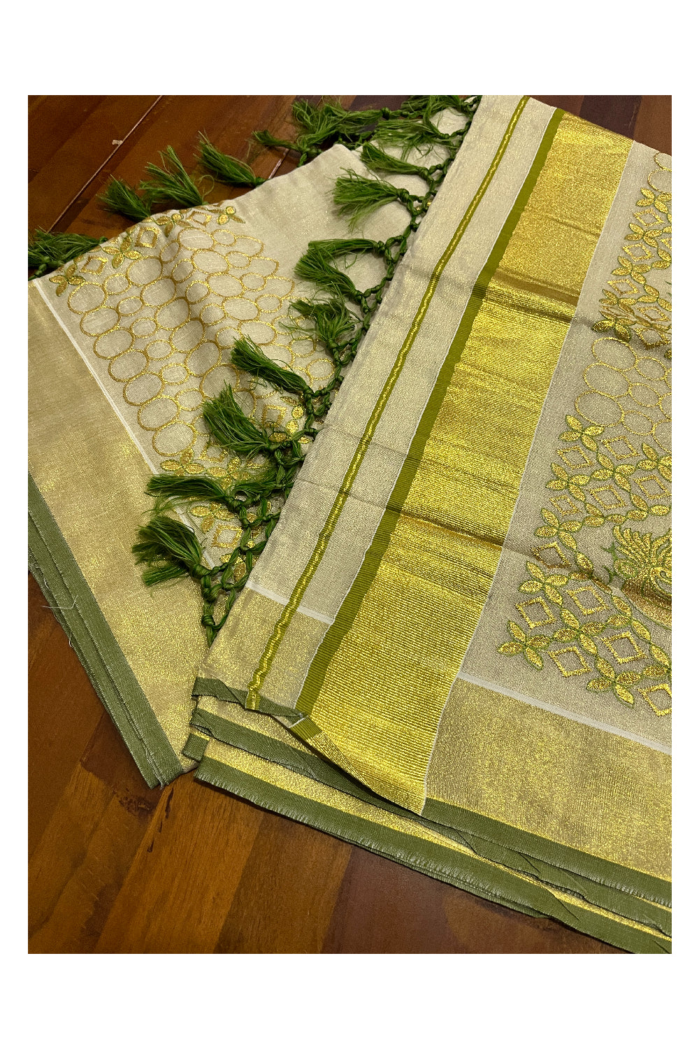 Kerala Tissue Kasavu Heavy Work Saree with Golden and Green Peacock Embroidery Design