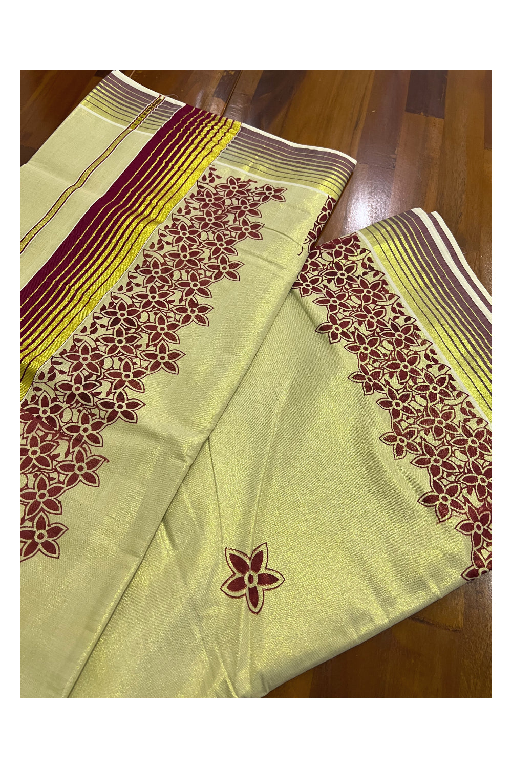 Kerala Tissue Kasavu Saree With Maroon Mural Floral Design