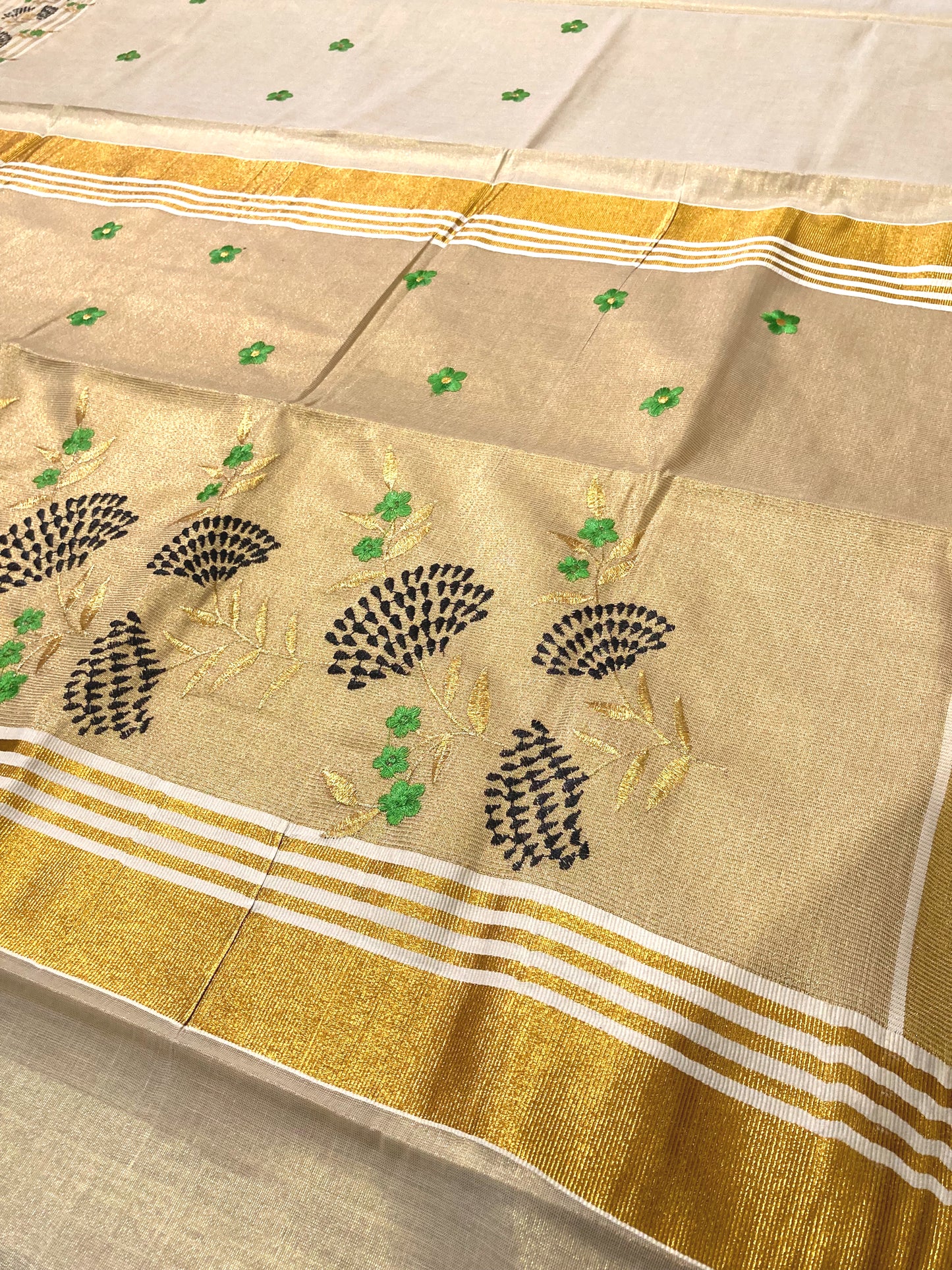 Kerala Kasavu Tissue Saree with Floral Thread works on Pallu and Border