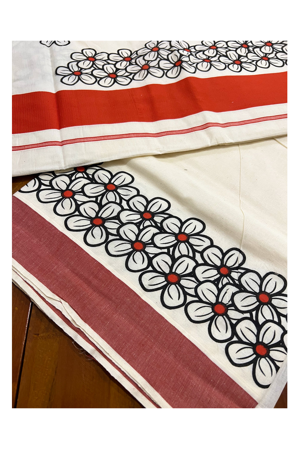 Southloom Kerala Saree with Black Floral Block Prints and Dark Orange Border