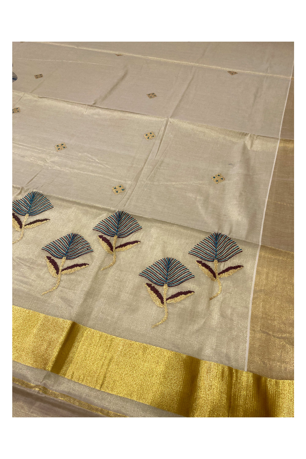 Kerala Tissue Kasavu Saree with Floral Embroidery Works