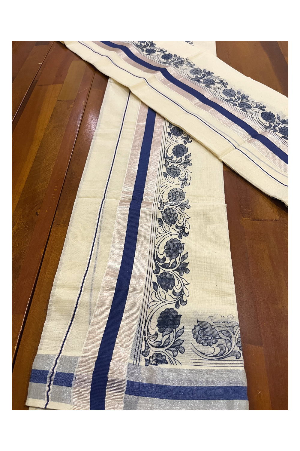 Pure Cotton Single Set Mundu (Mundum Neriyathum Vishu 2023) with Silver Kasavu and Blue Floral Block Prints 2.80 Mtrs