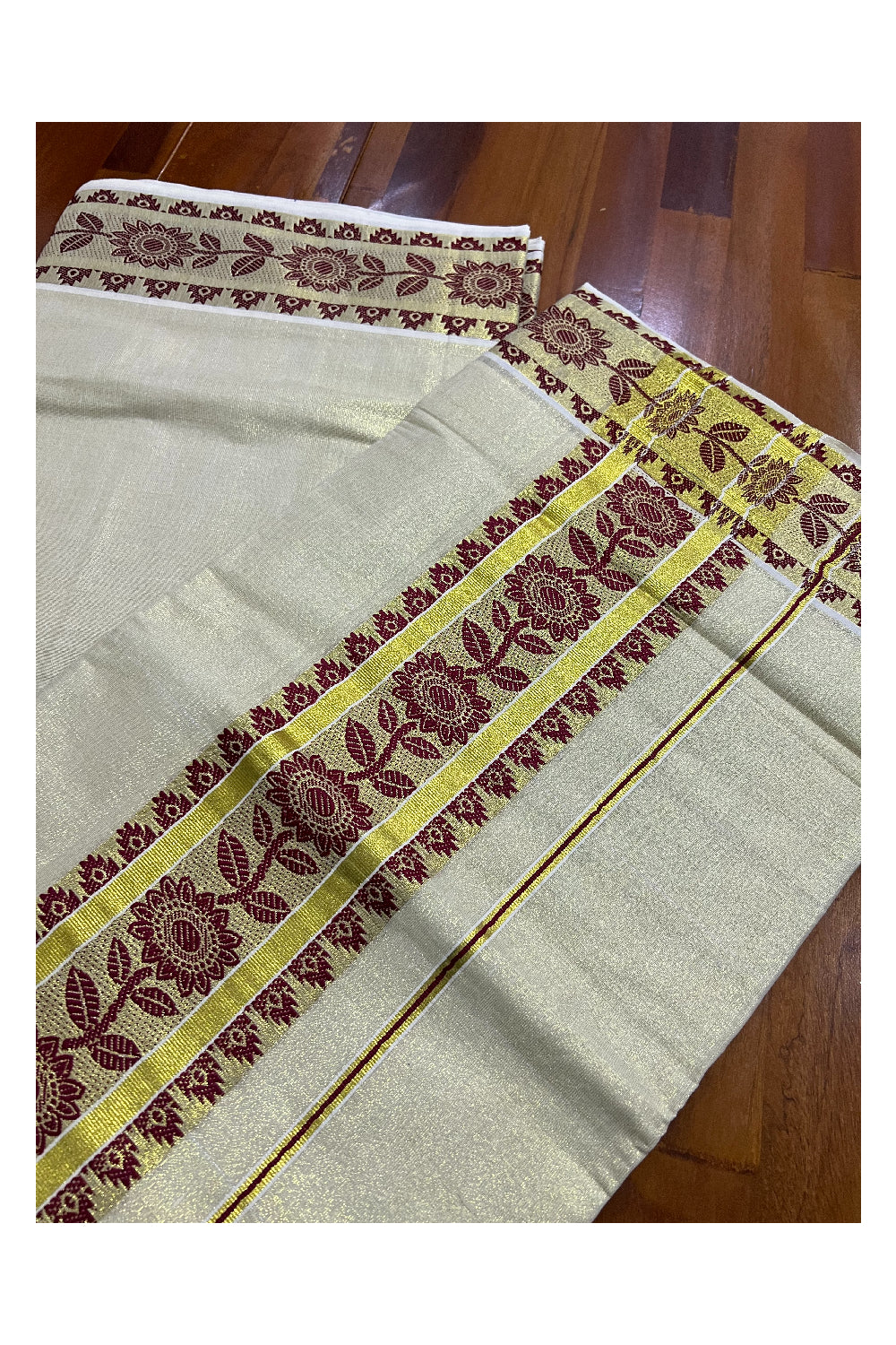 Kerala Tissue Kasavu Saree With Maroon Floral Woven Design on Border and Pallu