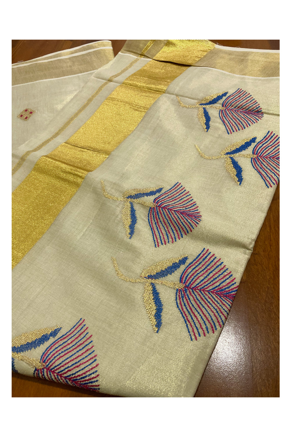 Kerala Tissue Kasavu Saree with Floral Embroidery Works