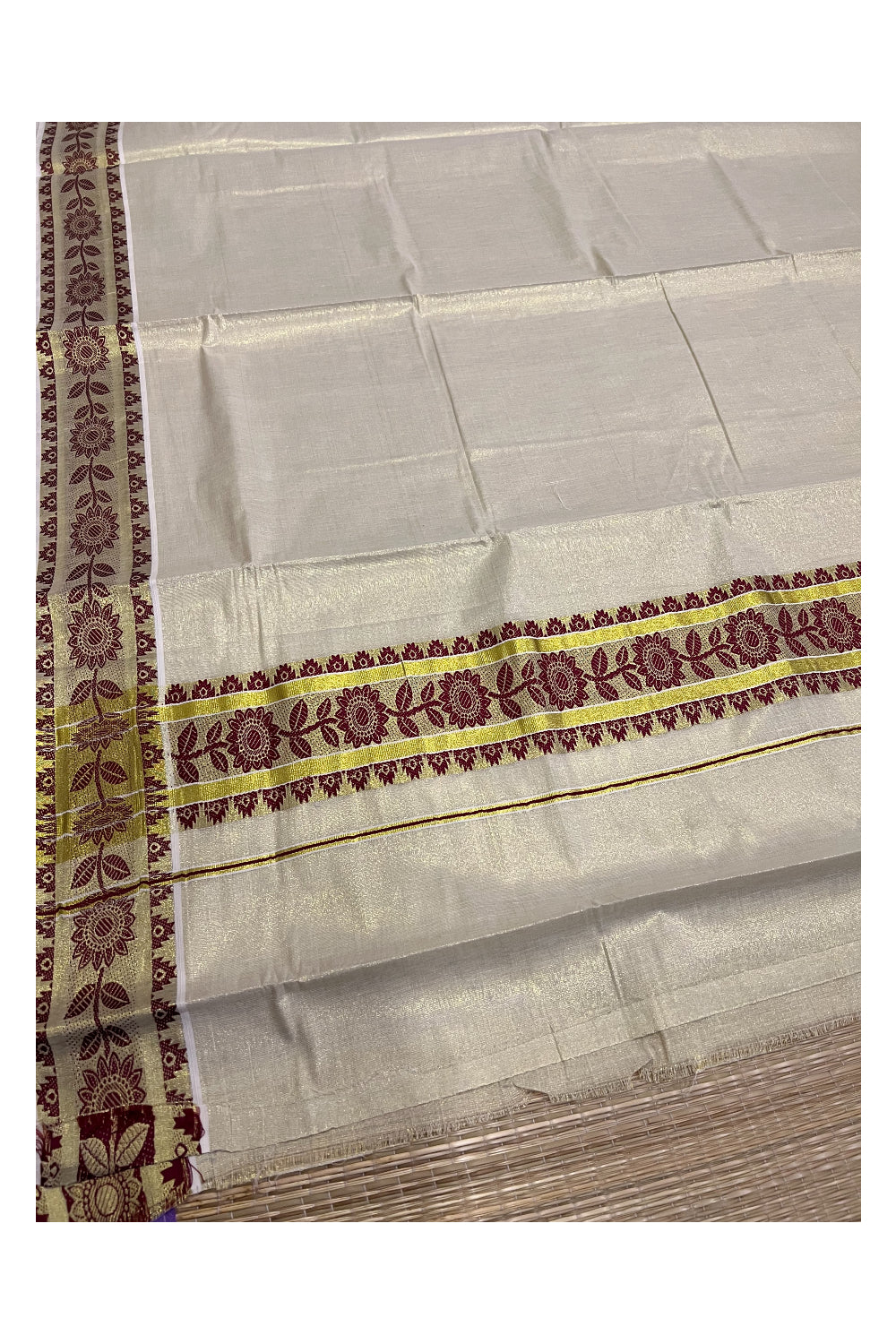 Kerala Tissue Kasavu Saree With Maroon Floral Woven Design on Border and Pallu