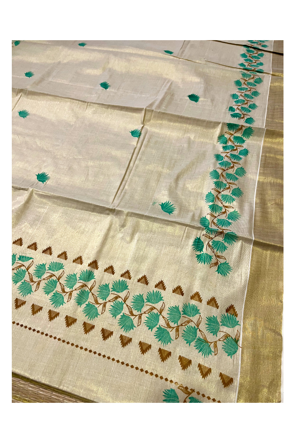 Kerala Tissue Kasavu Saree with Brown Turquoise Floral Block Printed Design Border