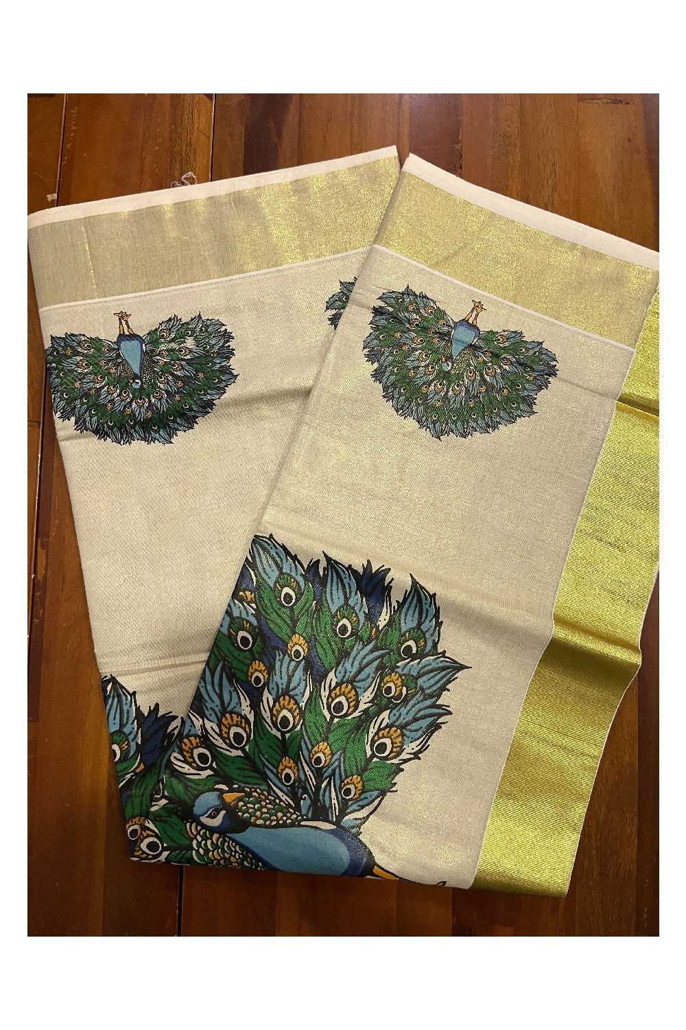 Kerala Tissue Kasavu Saree with Peacock Mural Printed Design