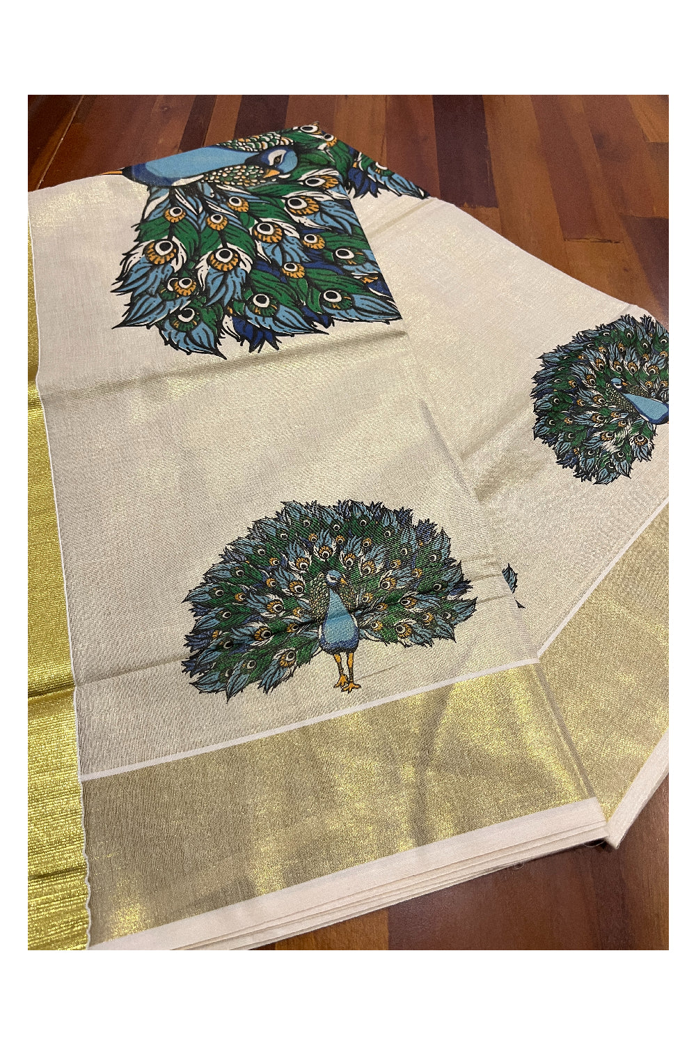 Kerala Tissue Kasavu Saree with Peacock Mural Printed Design